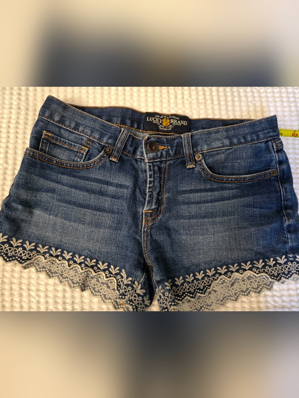 Lucky Brand Dark Blue High-Rise Jeans with Cream Embroidered Lace Hem